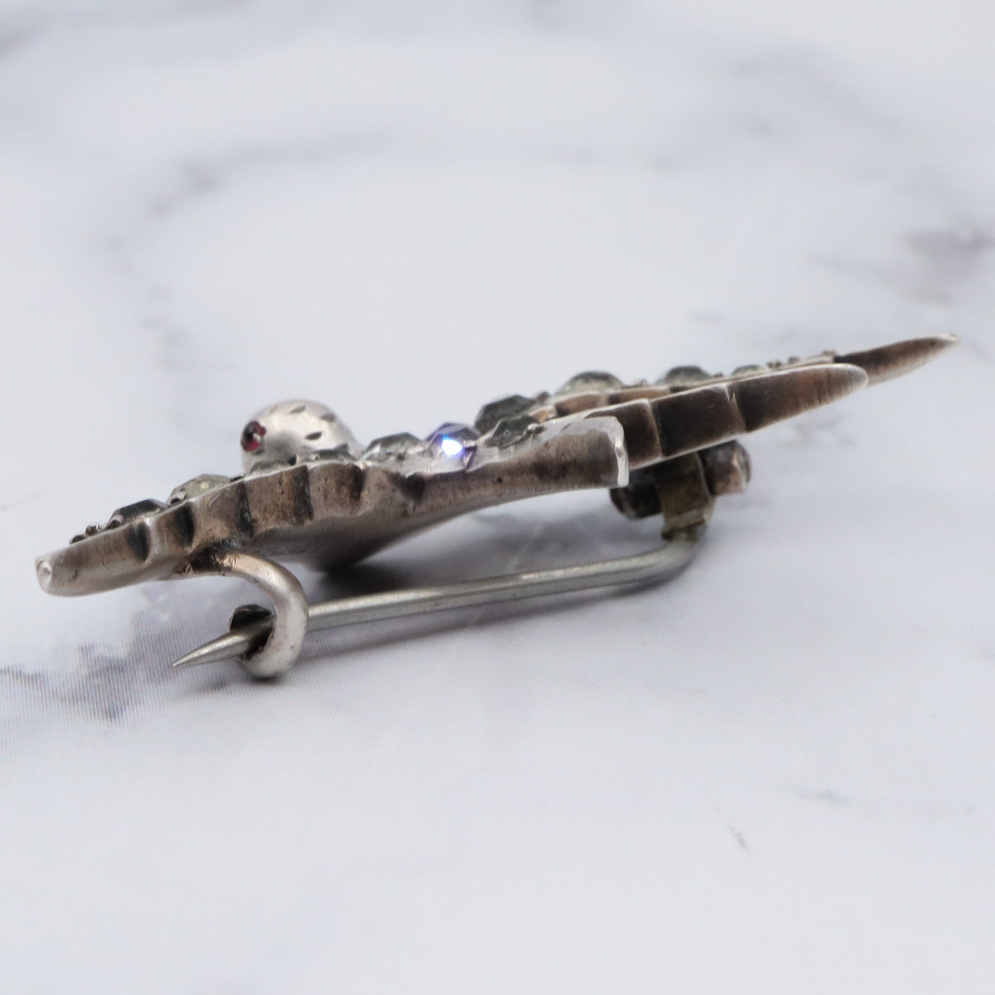 Antique Victorian .900 European handmade silver & paste gems swallow bird pin with ruby glass eyes